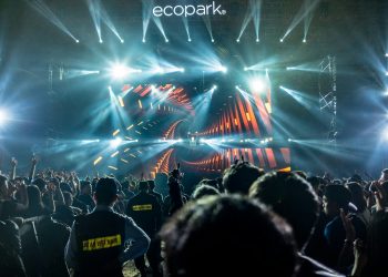 people standing in front of Eco Park stage