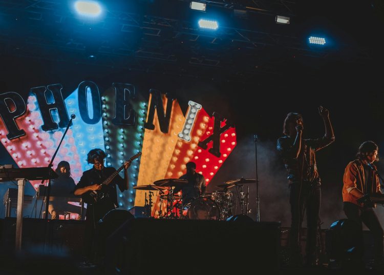 group of band performing on stage
