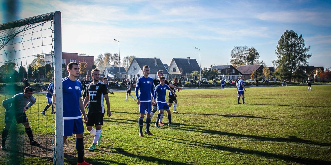 group of football player under blue sky
