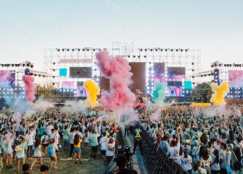 people gathering on green grass field during daytime
